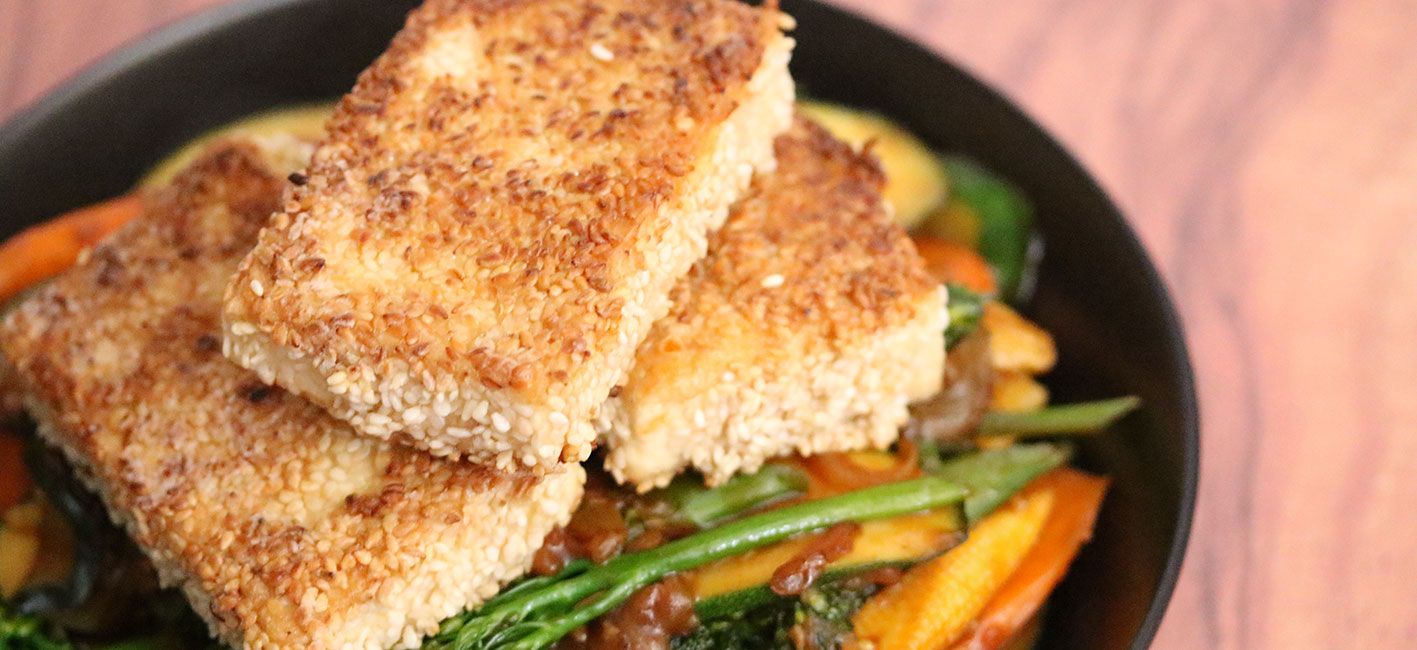 Sesame-Crusted Tofu on a Bed of Vegetable Stir-Fry